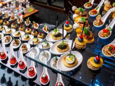 A buffet table with caviar appetizers